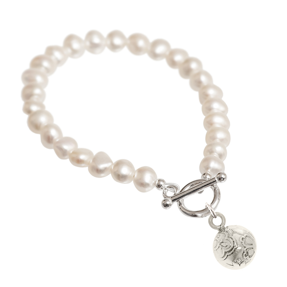 cream pearl bracelet with silver charm