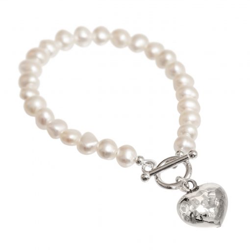 cream pearl bracelet with beaten silver heart